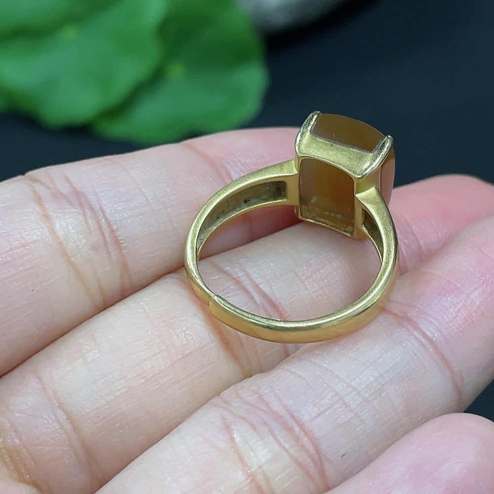 Adjustable Hetian Jade ring with 18K gold band, featuring smooth green jade stone and elegant design by HKHQ.