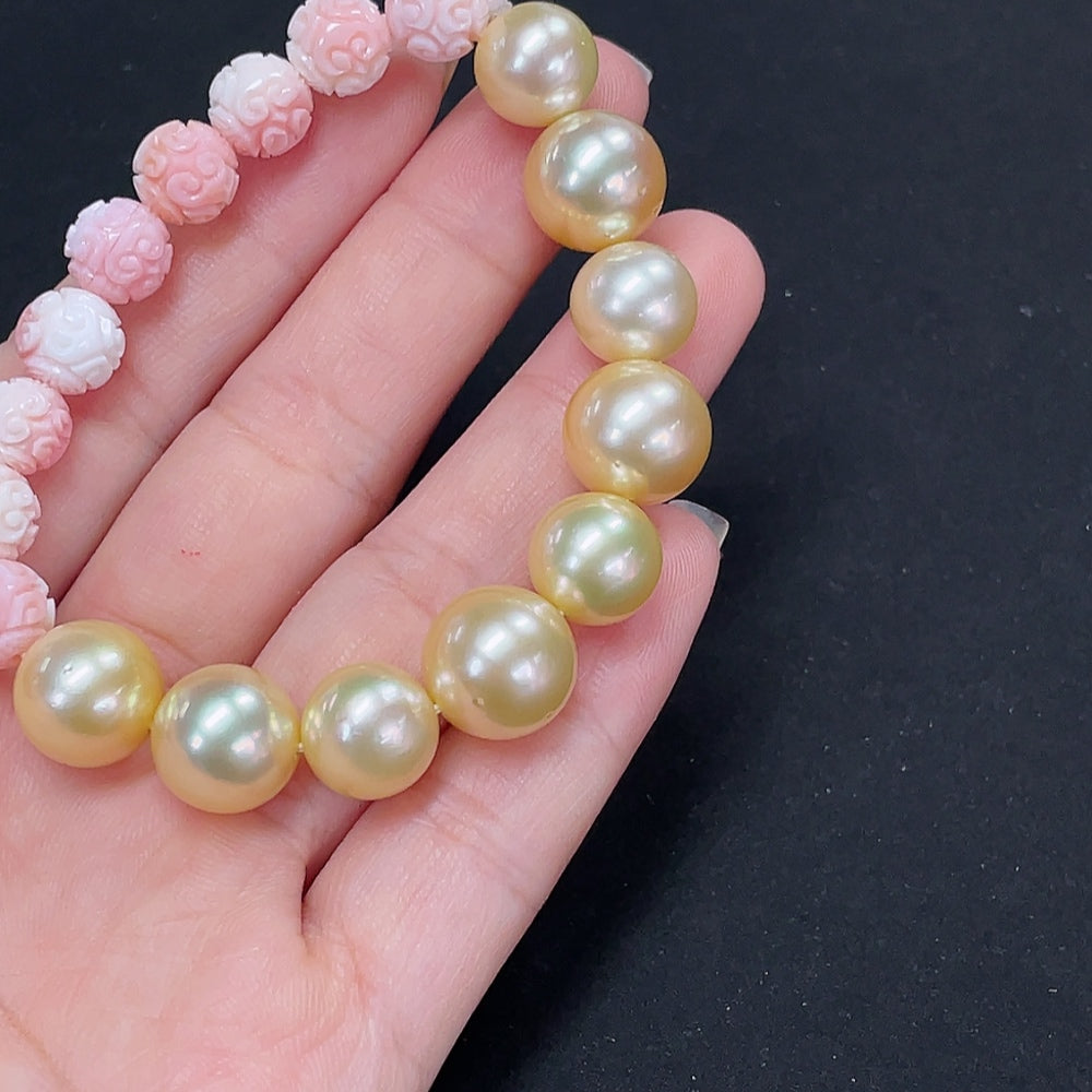HKHQ seawater pearl bracelet with yellow pearls, 10-11.8mm, weighing 24.15g, featuring natural-looking pearl stones.