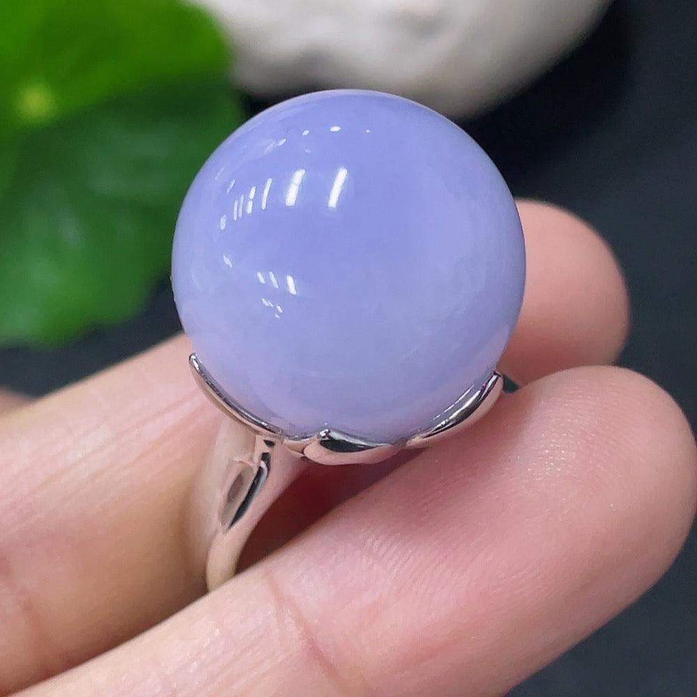Huiliu Certified jadeite inlaid ring featuring intricate jade design on a polished band.