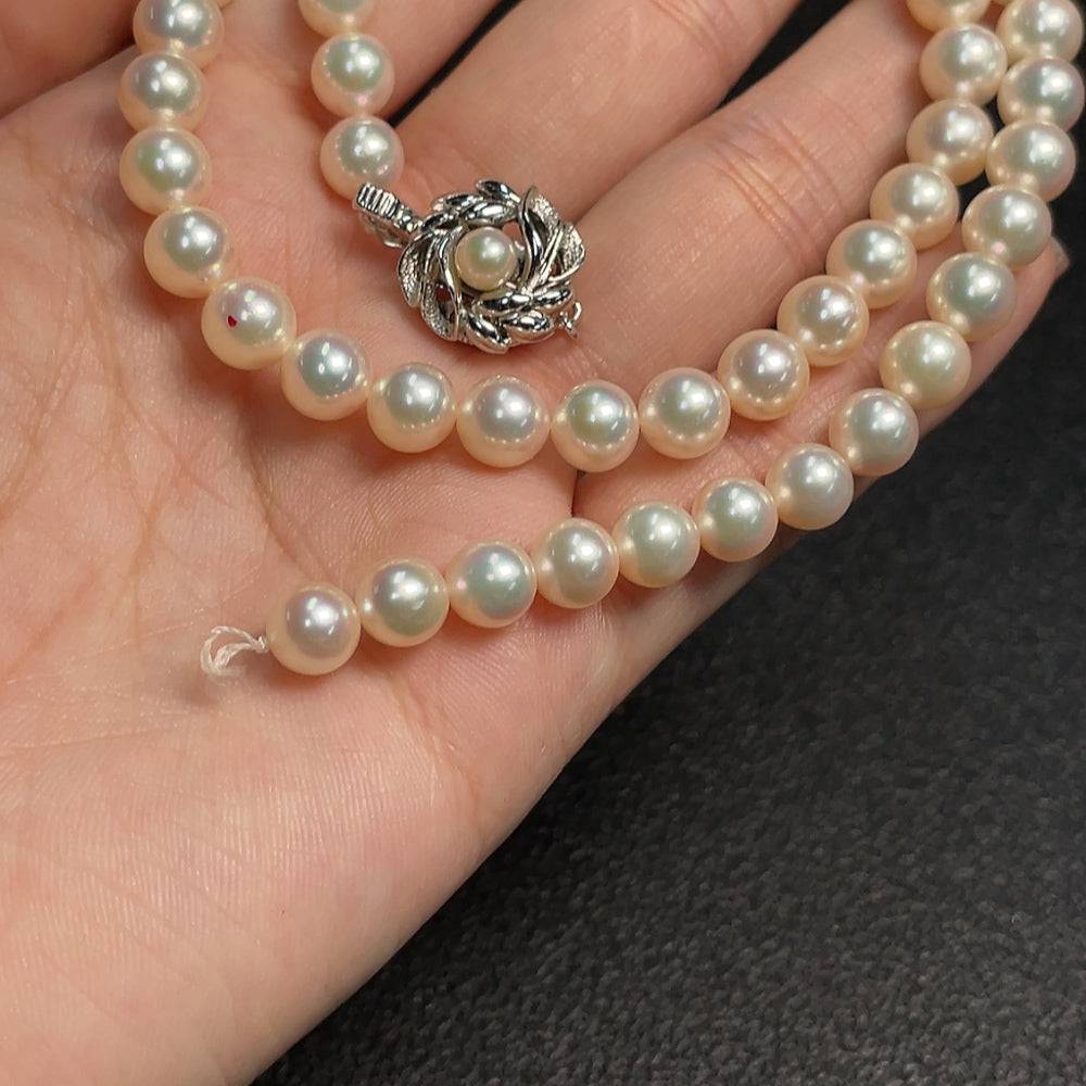 HUILIU HQ seawater pearl necklace with 6.8mm white pearls, non-gold, weighing about 29.84g, displayed on a neutral background.