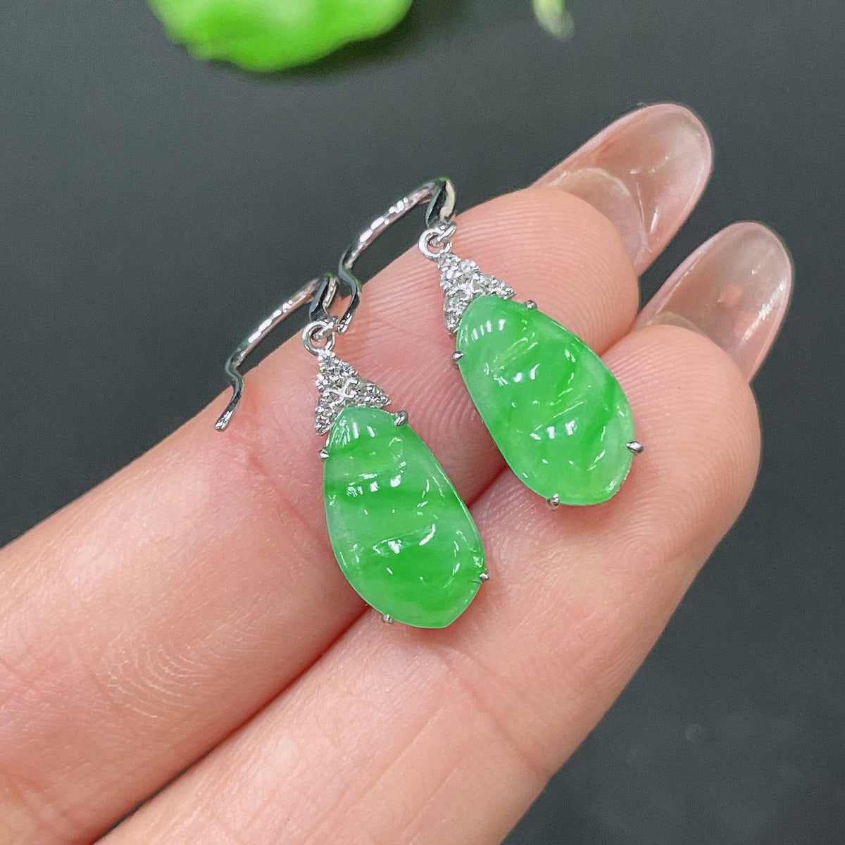 HUILIU HQ jadeite earrings with 18k gold and diamond inlays, lightweight jewelry featuring elegant jade stones and sparkling accents.