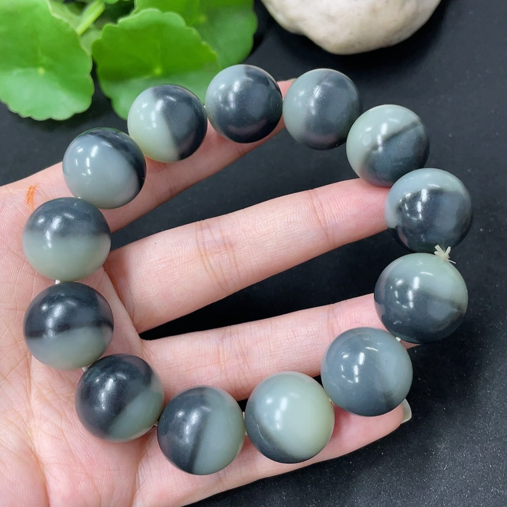 HKHQ Hetian Jade bracelet with 17.8mm beads, showcasing smooth, polished jade stones in a stylish beaded design.