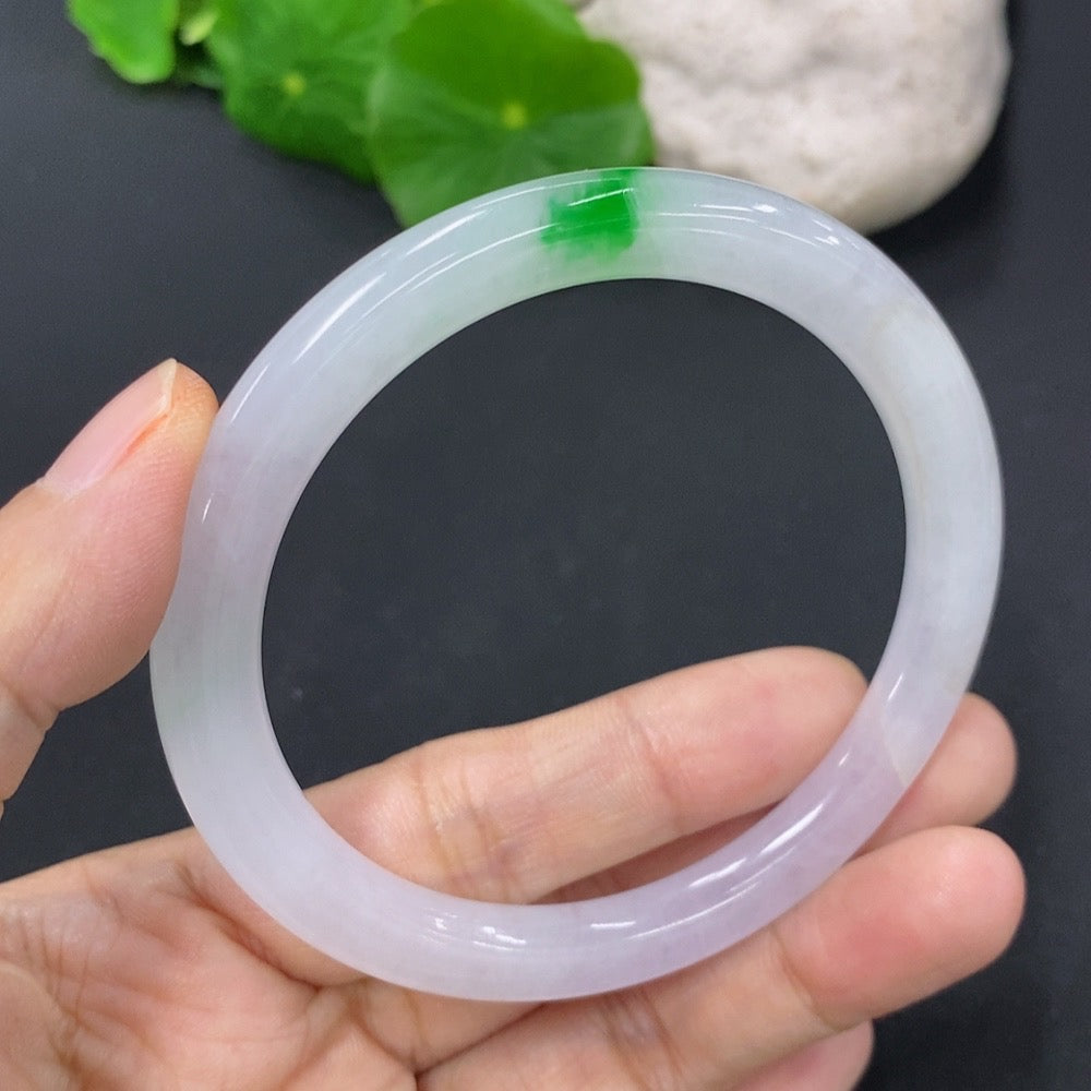 HKHQ jadeite round bangle with a smooth finish, size 54.5, weighing approximately 25.24g, showcasing rich green color and craftsmanship.