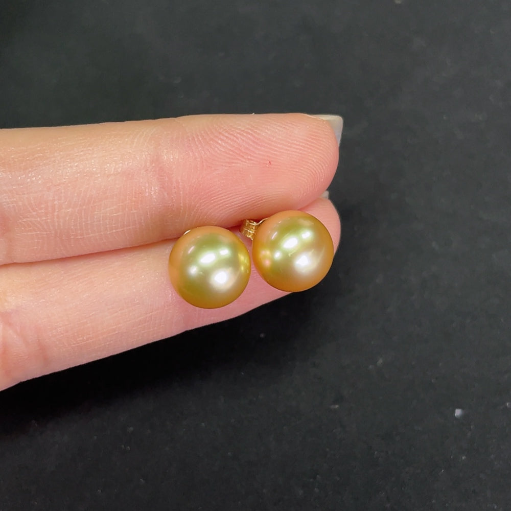 Saltwater pearl stud earrings in 14K gold with 9.3mm pearls, featuring elegant, natural pearl jewelry from HKHQ.