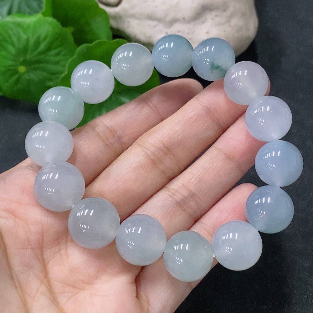 HUILIU HQ jadeite bracelet with 12.5mm beads, showcasing smooth, polished green jade stones, total weight approximately 57.1 grams.