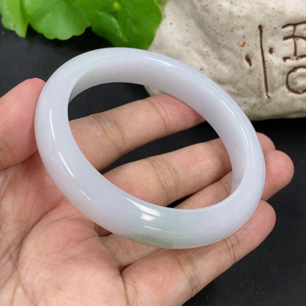 HKHQ jadeite round bracelet, 53.57g, size 55.7, showcasing smooth, polished green jade beads on a white background.