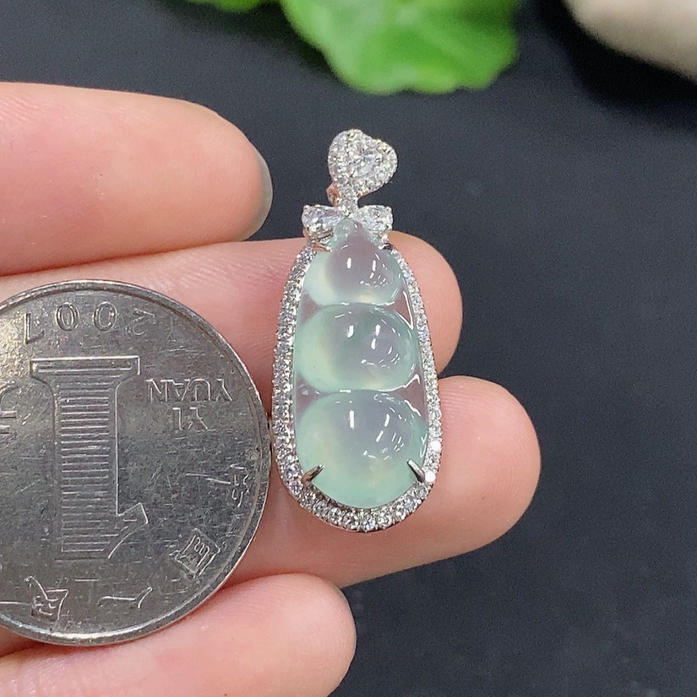 Jadeite lucky bean pendant with inlaid details, crafted by HKHQ, featuring 18k non-diamond setting and a total weight of 2.68g.