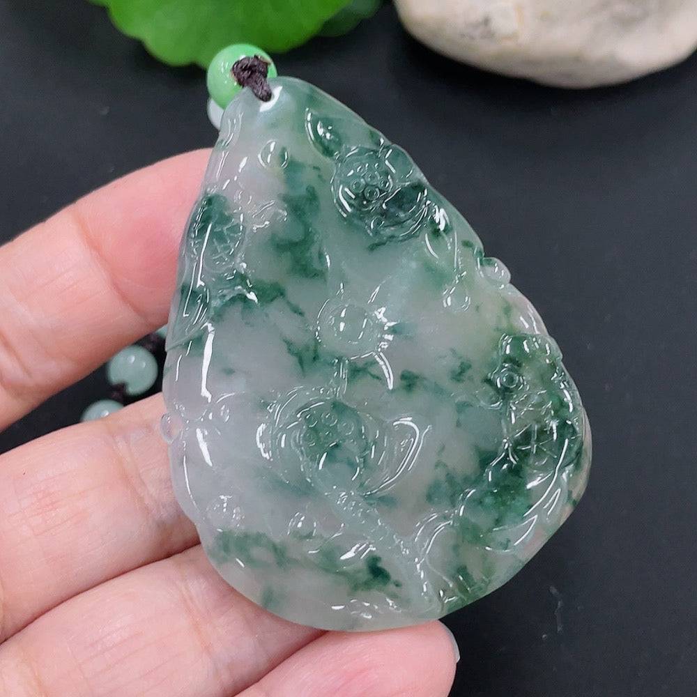 Huiliu Jadeite Auspicious Yearly Abundance Pendant with intricate carvings on smooth jade, symbolizing prosperity and good fortune.