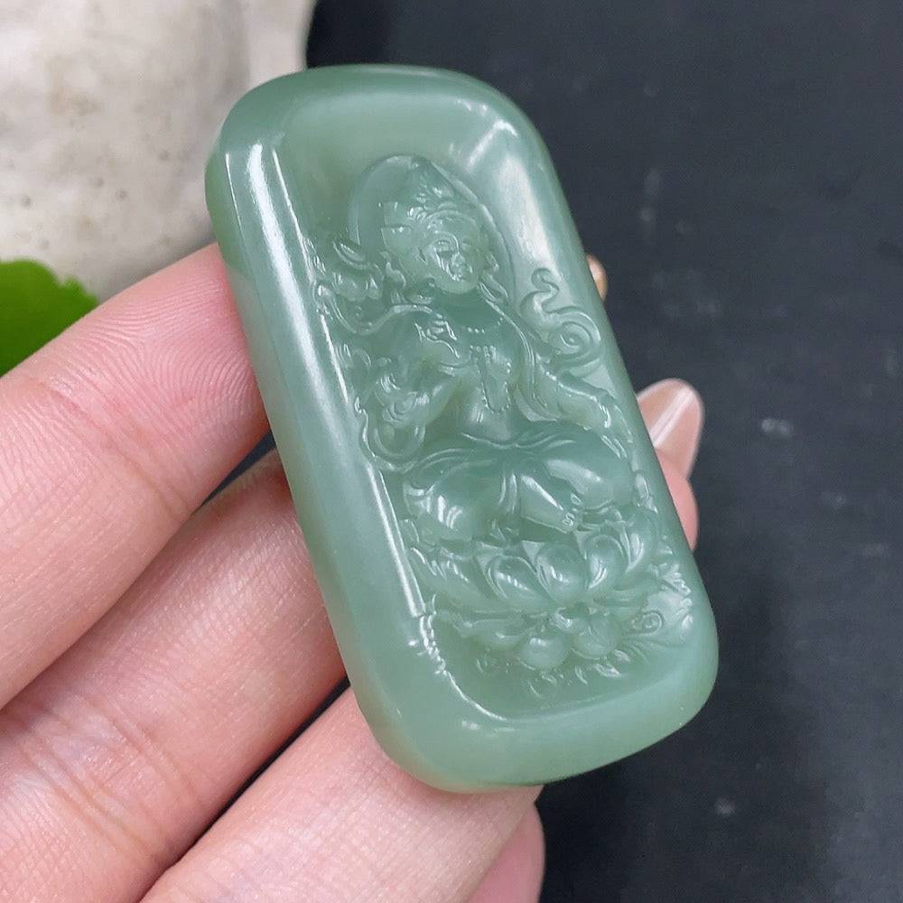 Green Hetian Jade Pendant featuring a Green Tara design by Huiliu, showcasing intricate craftsmanship and vibrant jade color.