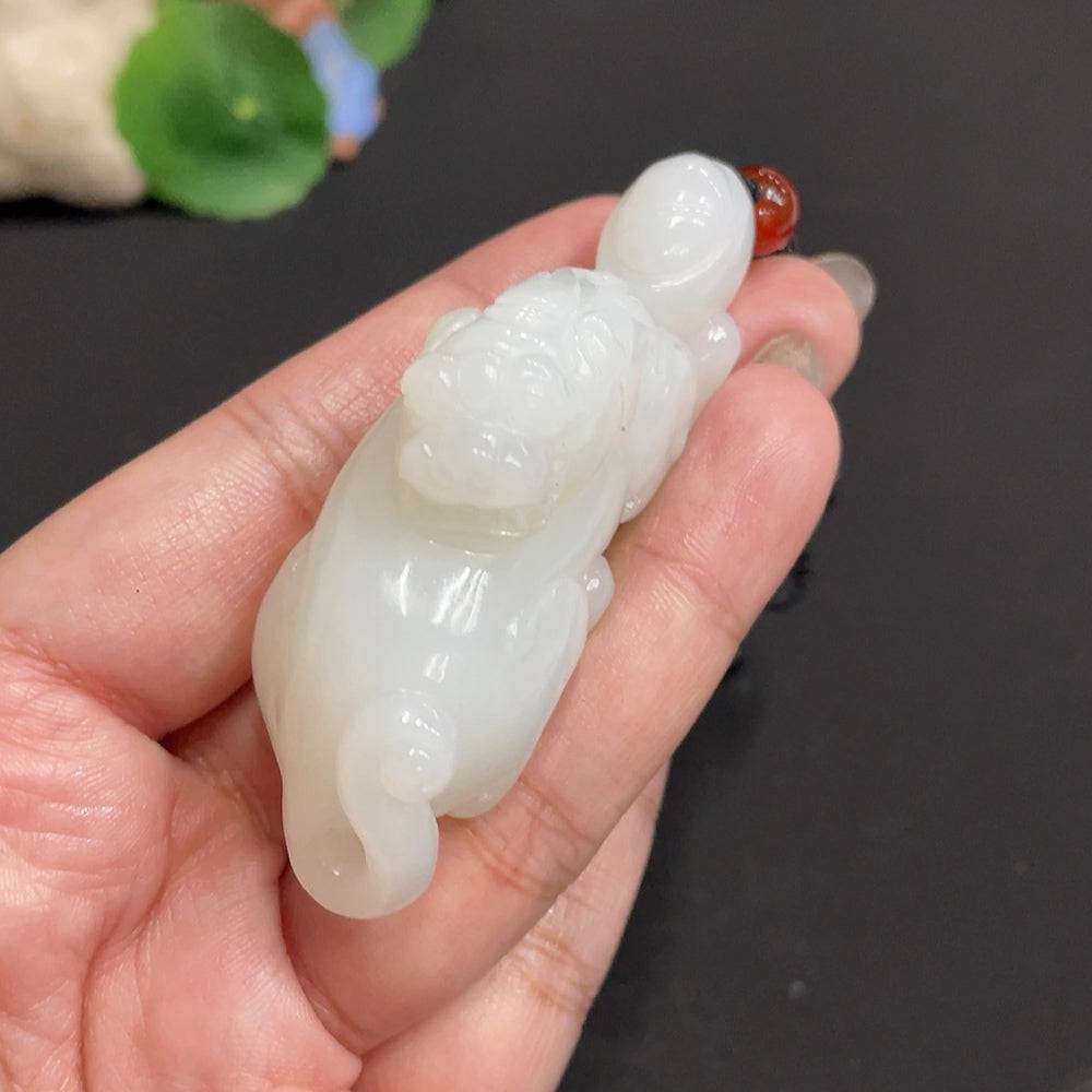 Hetian jade pendant featuring an auspicious beast design with non-Hetian jade beads, total weight approximately 65.3g, on a rope.
