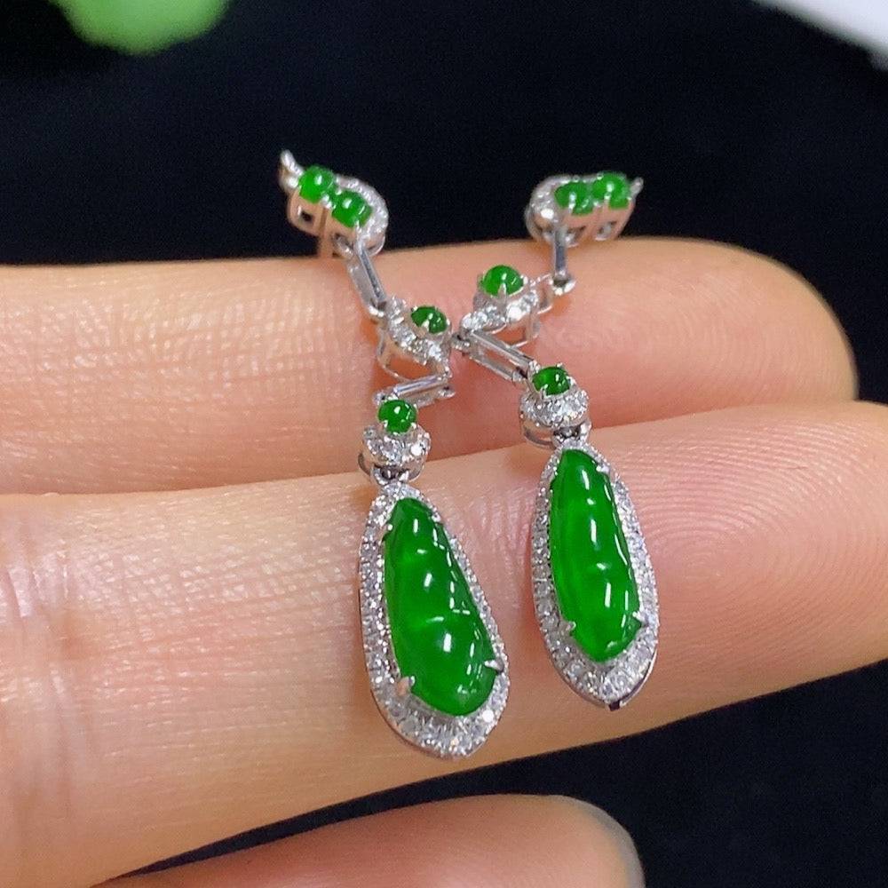Jadeite auspicious bean inlaid earrings by HUILIU HQ with 18k gold and diamond accents, featuring intricate jade and gold craftsmanship.
