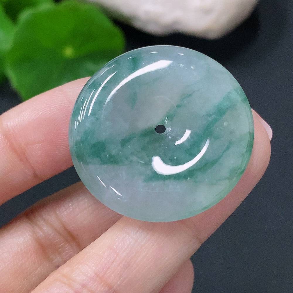 Jadeite peace knot pendant from HUILIU HQ, showcasing a polished jade jade necklace with a traditional knot design.