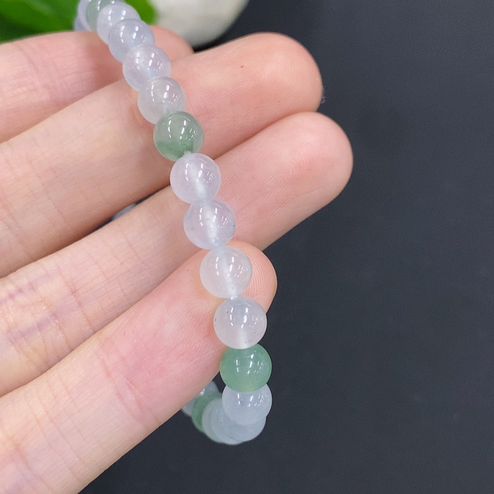 HUILIU HQ jadeite bracelet with 5.9mm beads, total weight approx. 11.4g, showcasing smooth, polished jade jewelry.