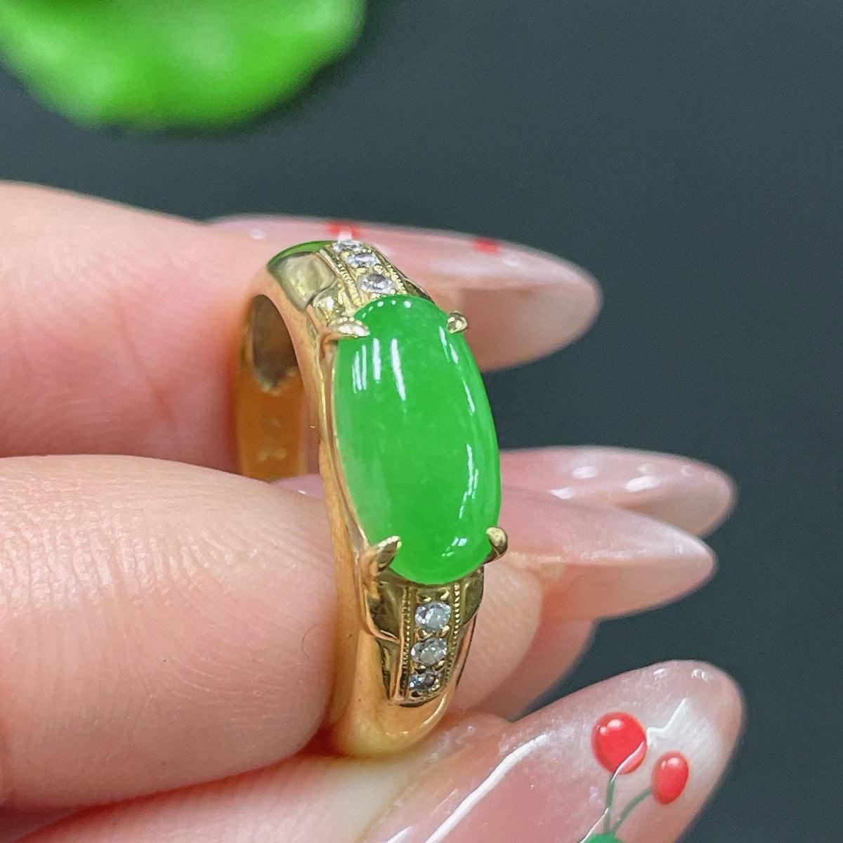 Jadeite ring with 18k gold setting and diamond accent, size 12, from HUILIU HQ, showcasing the elegant jewelry design.