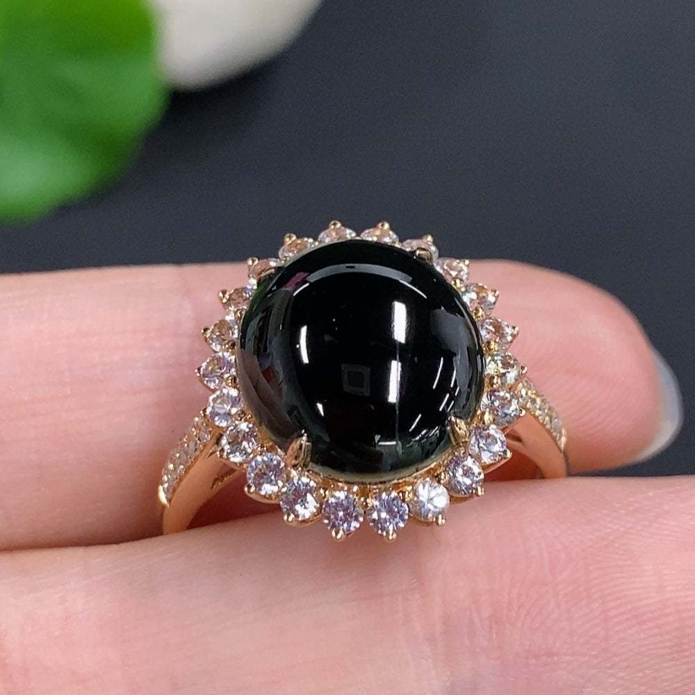 Jadeite cabochon ring with 18K gold (only the smallest accent stones are diamonds)