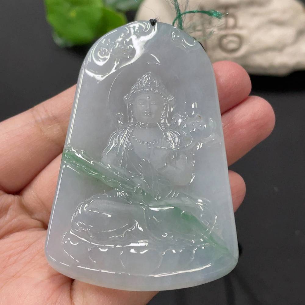 Jadeite Guanyin pendant with intricate carved details, weighing approximately 51.47g, from HUILIU HQ, showcasing smooth green jade craftsmanship.