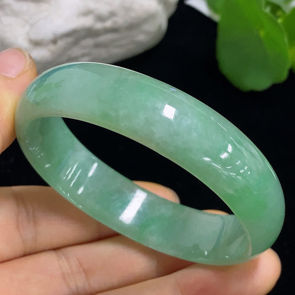 Jadeite concubine bracelet by HKHQ featuring smooth green jade stones and intricate design, size 52.5/47.8, weight 33.21g.