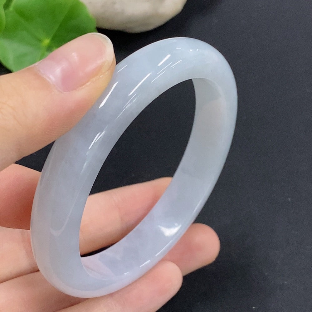HKHQ jadeite round bangle, size 55, weighing 48.5g, showcasing smooth, polished green jadeite bracelet on a white background.