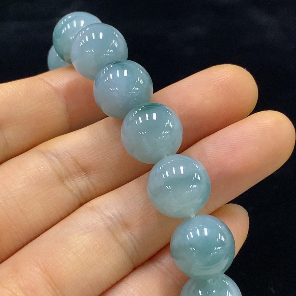 Jadeite bracelet with 12.5mm beads, featuring smooth green jade beads, weighing approximately 54.9g, from HUILIU HQ.
