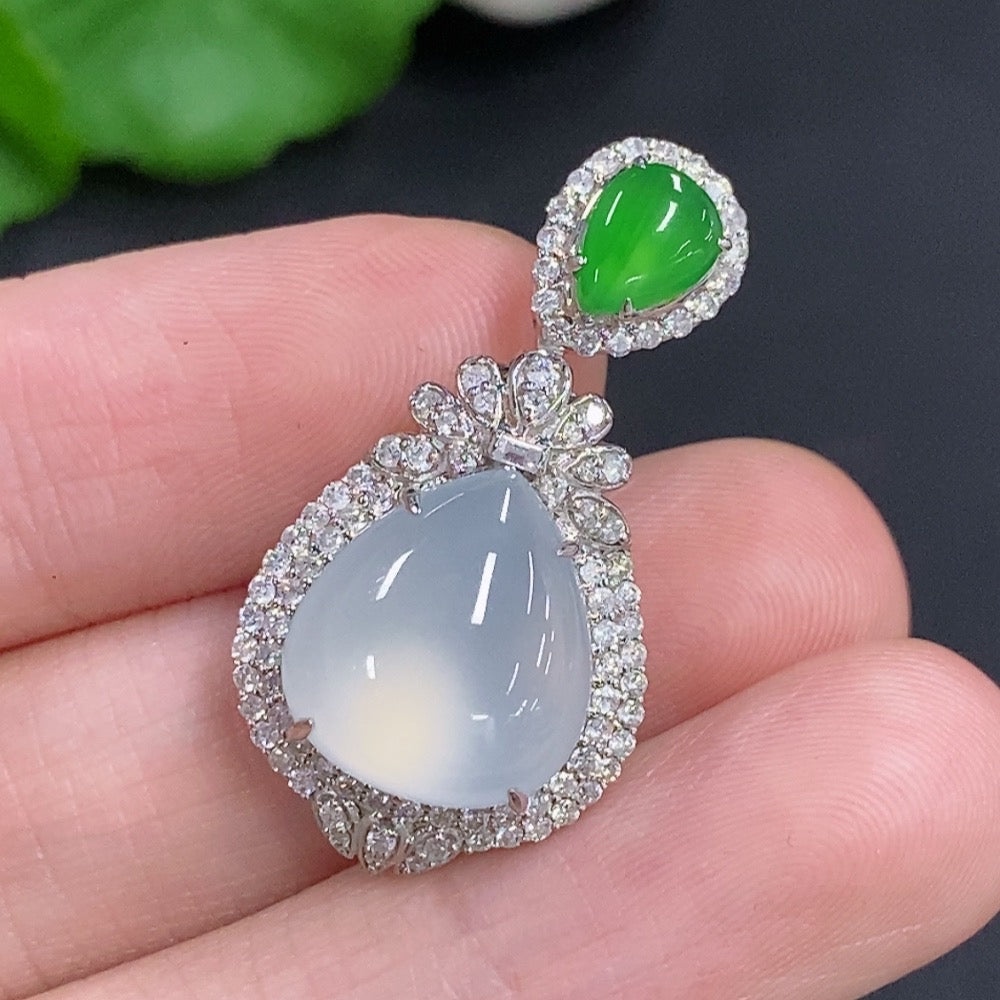 Jadeite water drop pendant necklace by HKHQ with 18K gold and diamond accents, showcasing a smooth jadeite pendant hanging from a delicate chain.