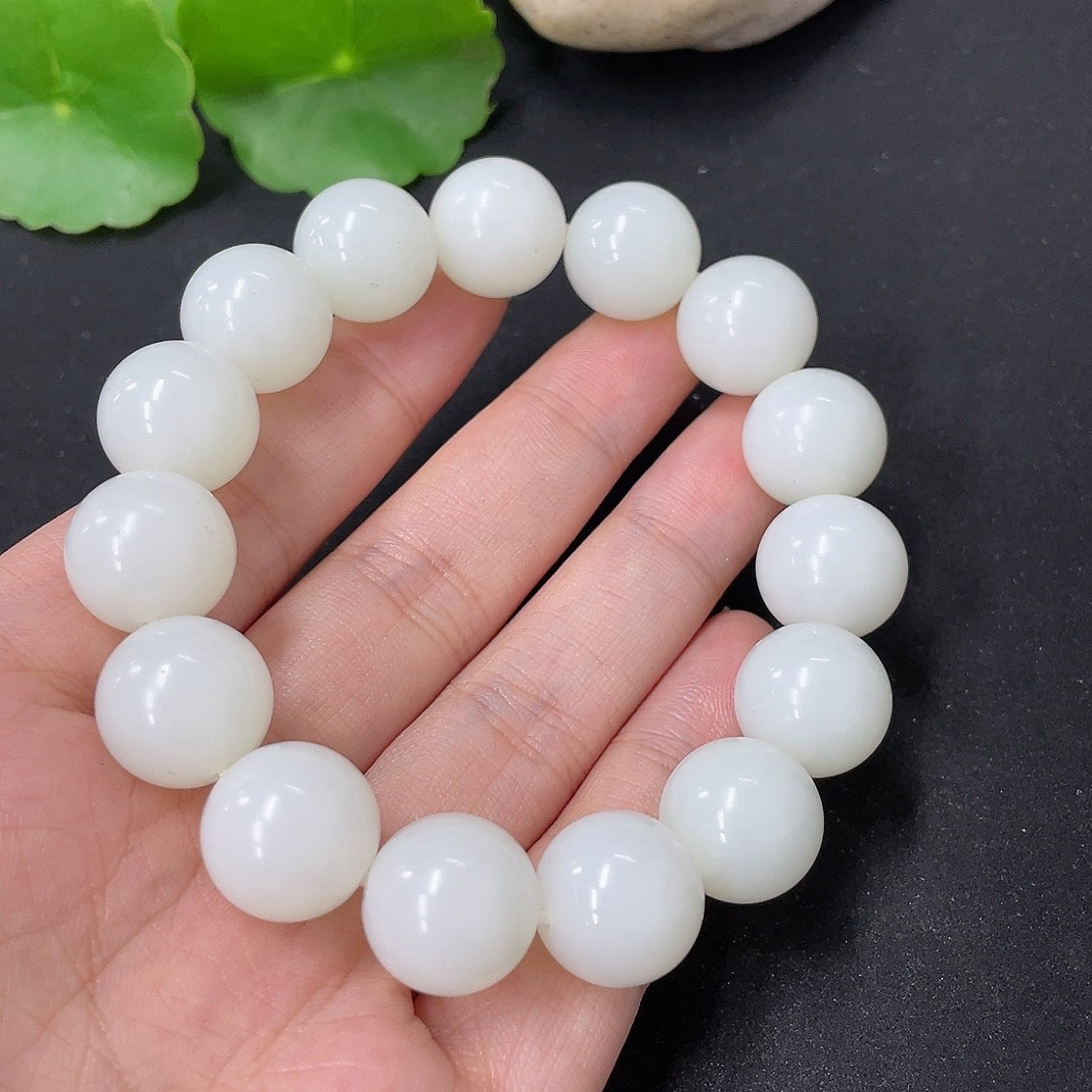 Hetian jade bracelet by HKHQ featuring 13.6mm smooth jade beads, total weight 62g, showcasing a polished, elegant jewelry piece.