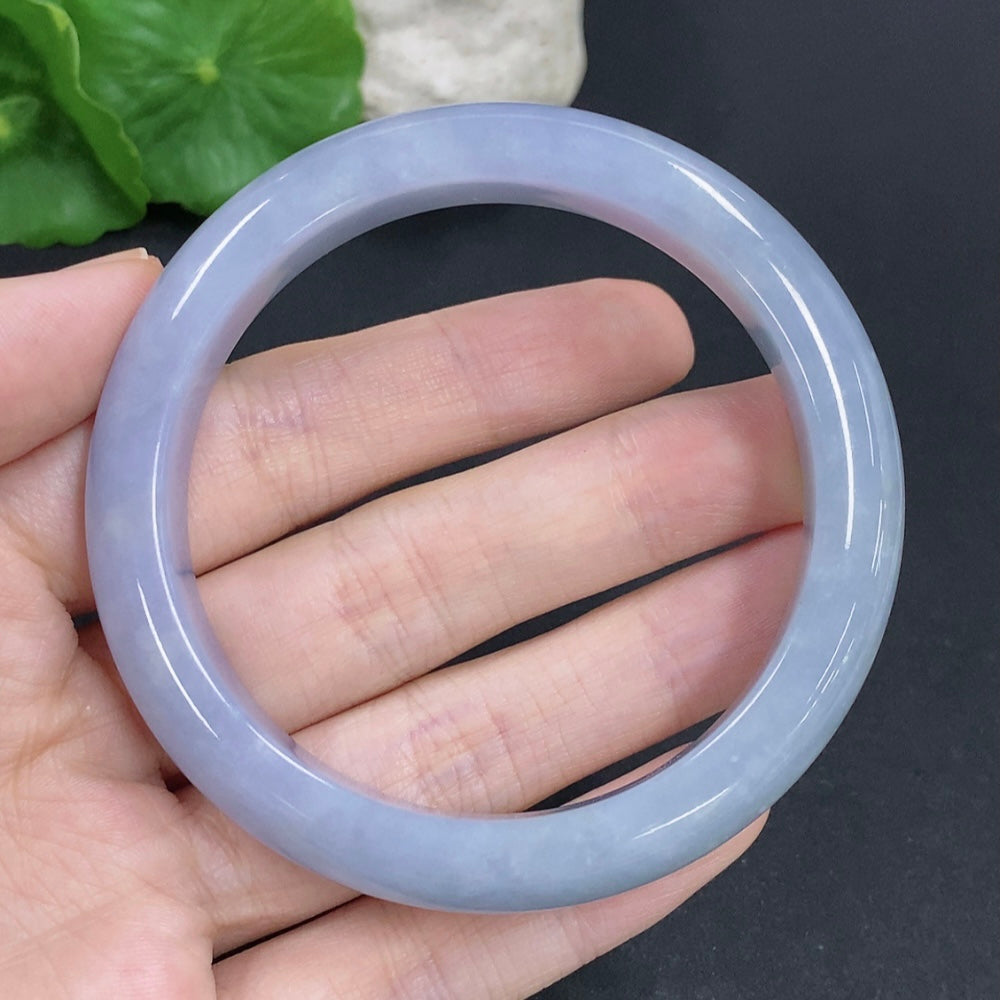Jadeite round bracelet with a total weight of 55.2g and size 57, featuring smooth green jade beads on a jewelry image.