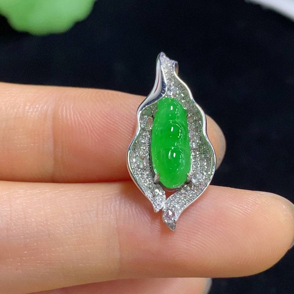 Huiliu Jadeite Blessed Bean Pendant with diamond accents, crafted from green jade, featuring intricate carvings and a polished finish.