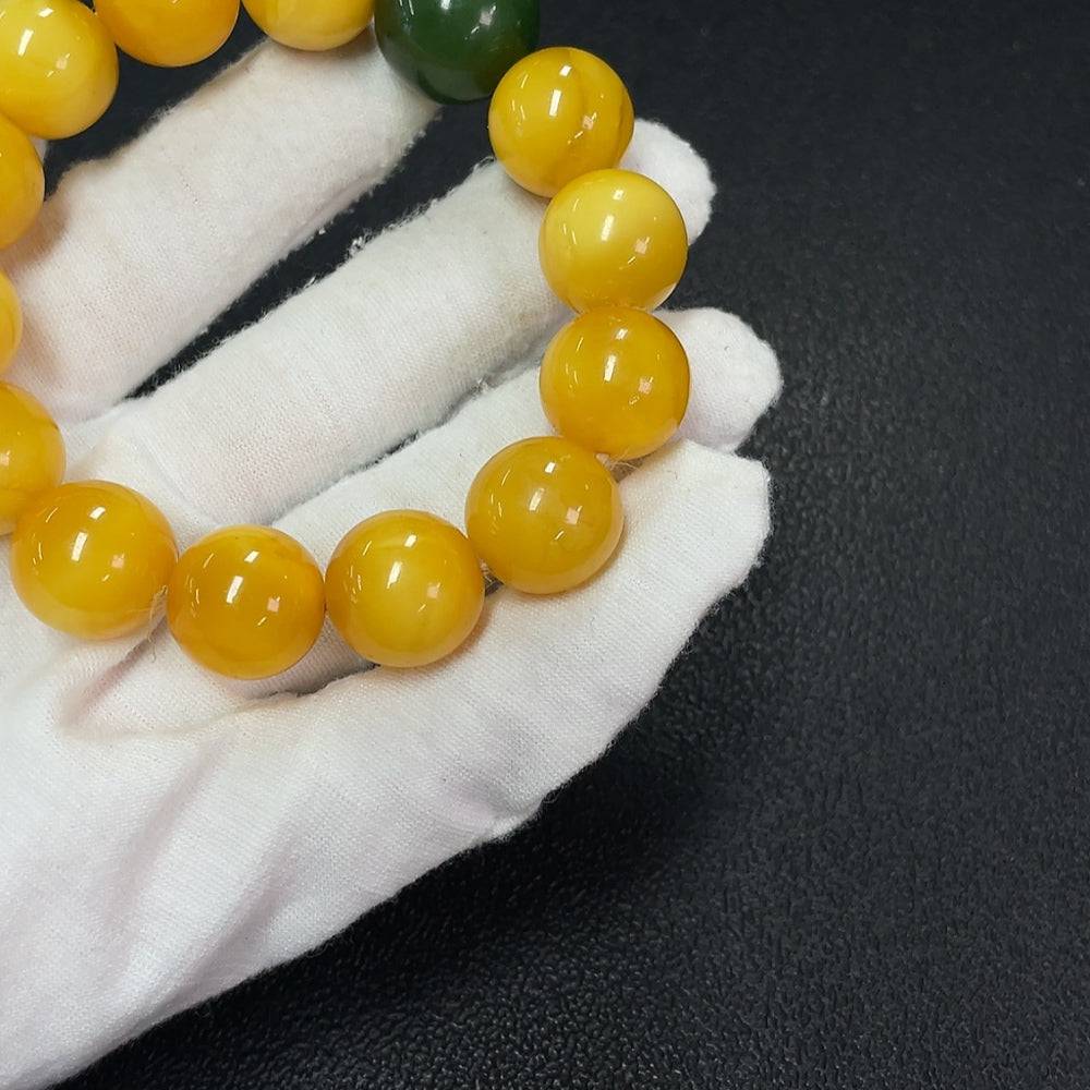 Amber beeswax bracelet with Hetian jade beads, partial repair, 15mm size, crafted by HUILIU HQ.