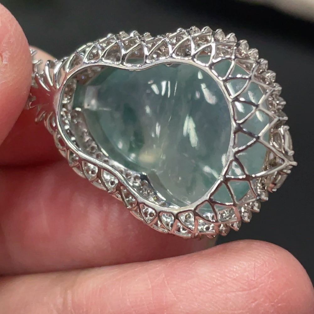 Jadeite gourd pendant with 18K gold setting and small diamond accents, featuring a smooth green jade stone, weight approx. 6.5g.