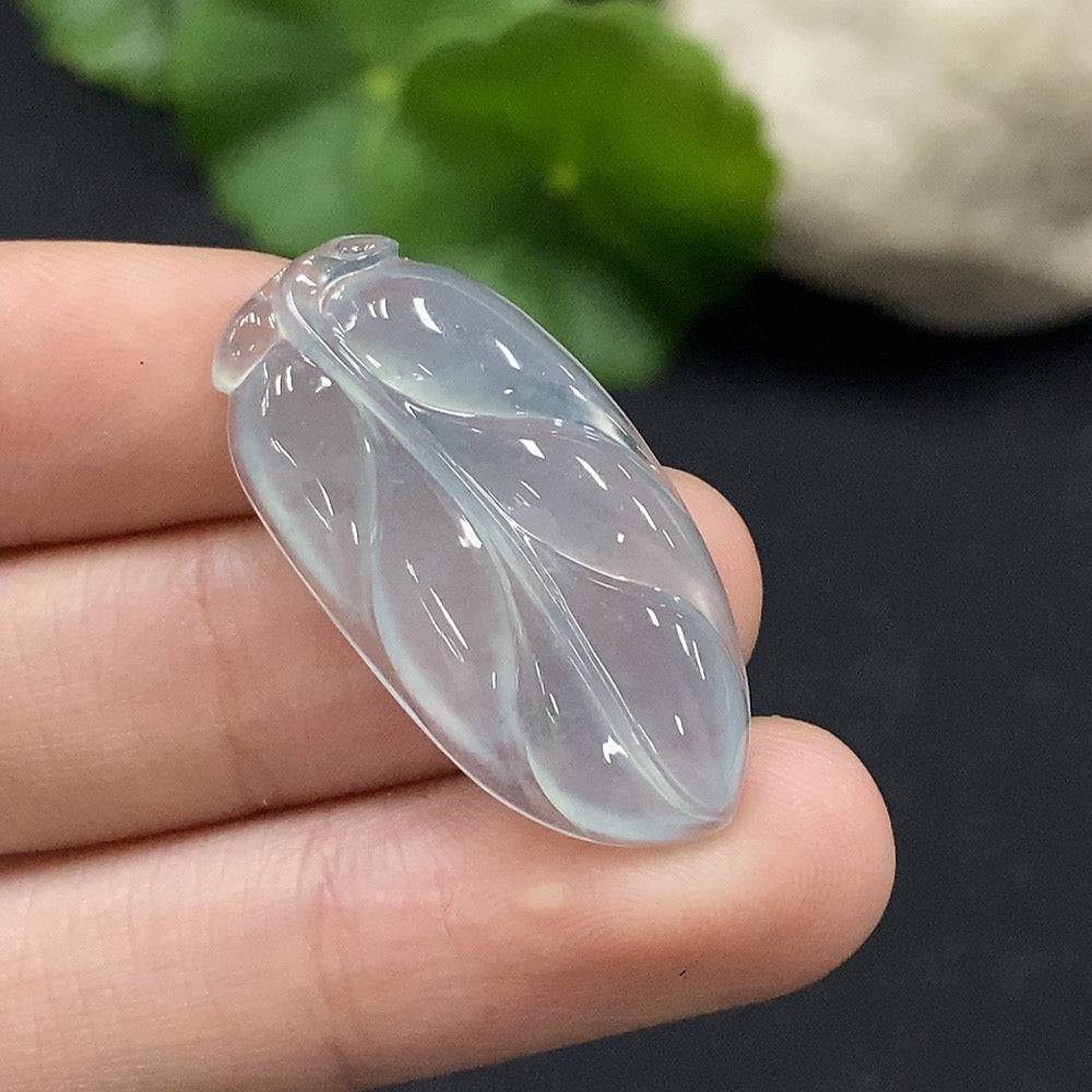 Jadeite leaf inlay piece from HUILIU HQ, weighing approximately 4.52g, showcasing detailed green jade craftsmanship.