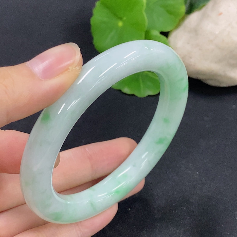 HKHQ jadeite round bangle, size 56, with a total weight of approximately 62.4g, showcasing smooth, polished jade jewelry.