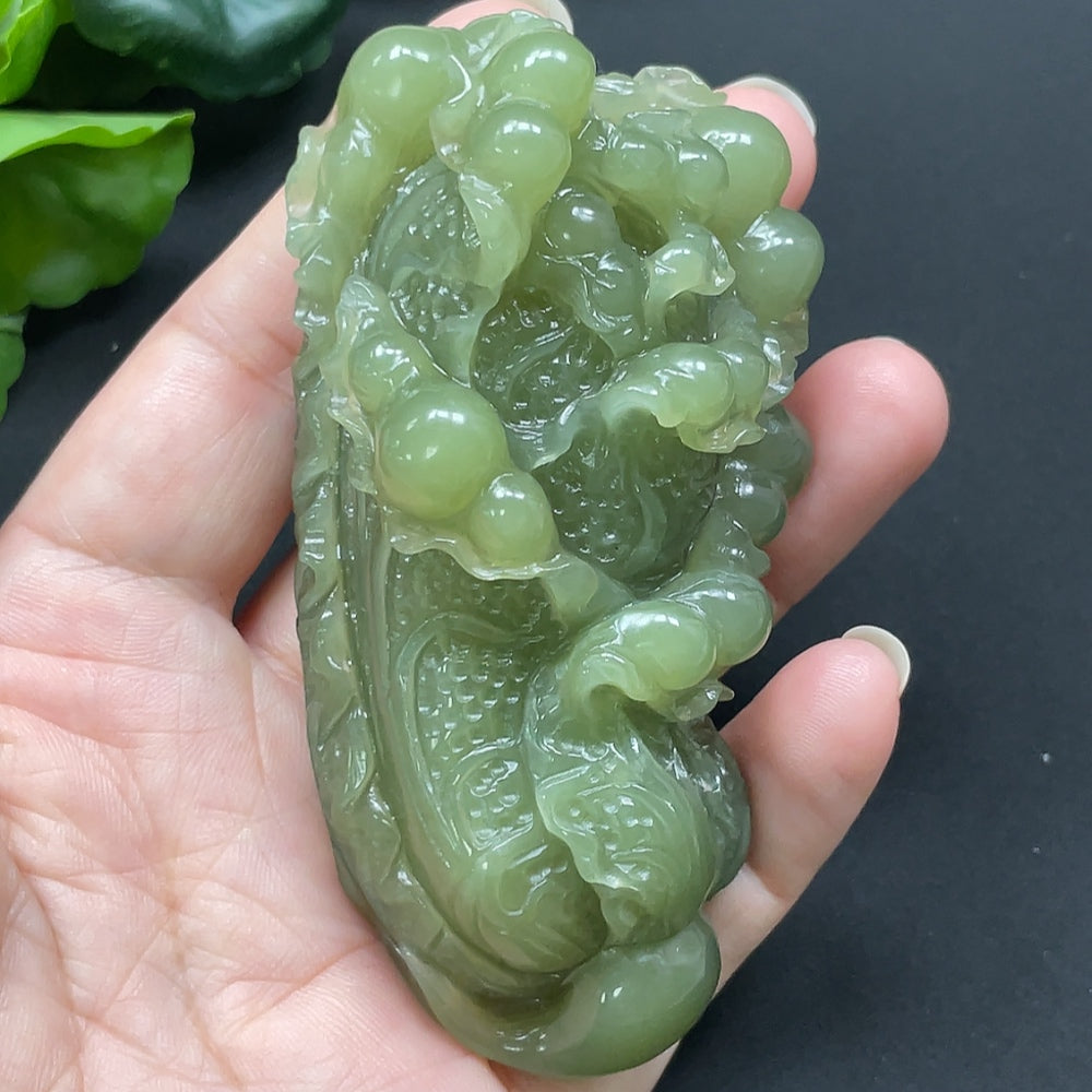 Beautiful Hetian Jade Cabbage Pendant necklace with intricate carving, crafted by HKHQ, showcasing traditional jade artistry.