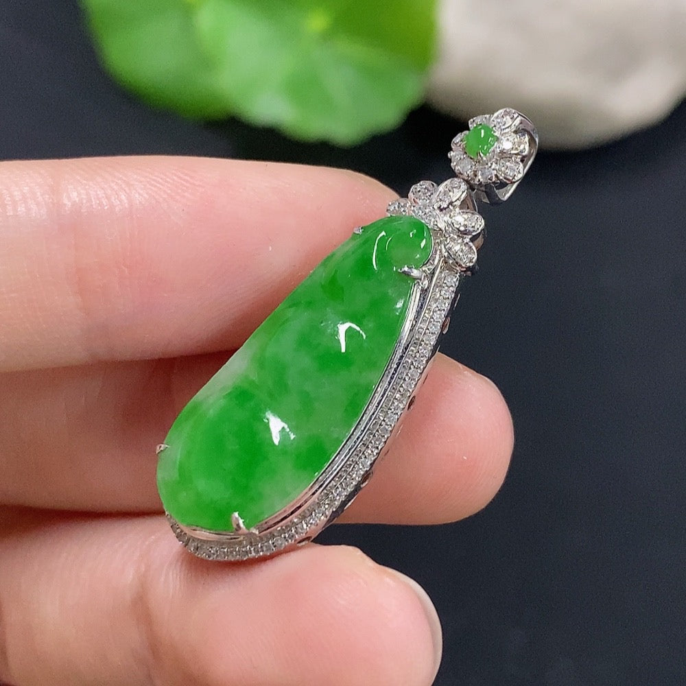 Jadeite bean inlay pendant by HKHQ with 18k gold and diamond accents, displayed against a neutral background.