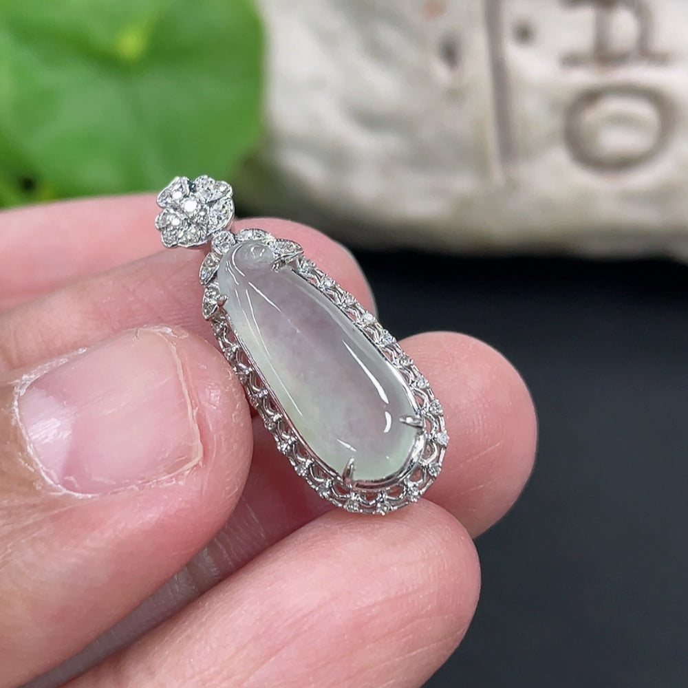 Jadeite blessing melon pendant set in 18K gold with diamond accents, weighing approximately 2 grams, from HKHQ.