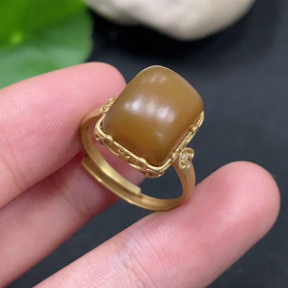 Hetian jade open-ended ring by HUILIU HQ with 18k gold accents and diamond details, showcasing intricate design and craftsmanship.