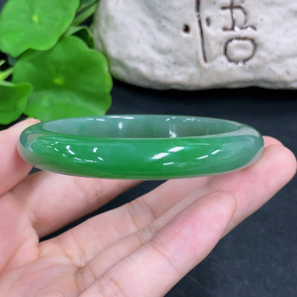 HKHQ jadeite round bangle in size 54, weighing 38.5g, showcasing smooth, polished jadeite with a glossy finish.