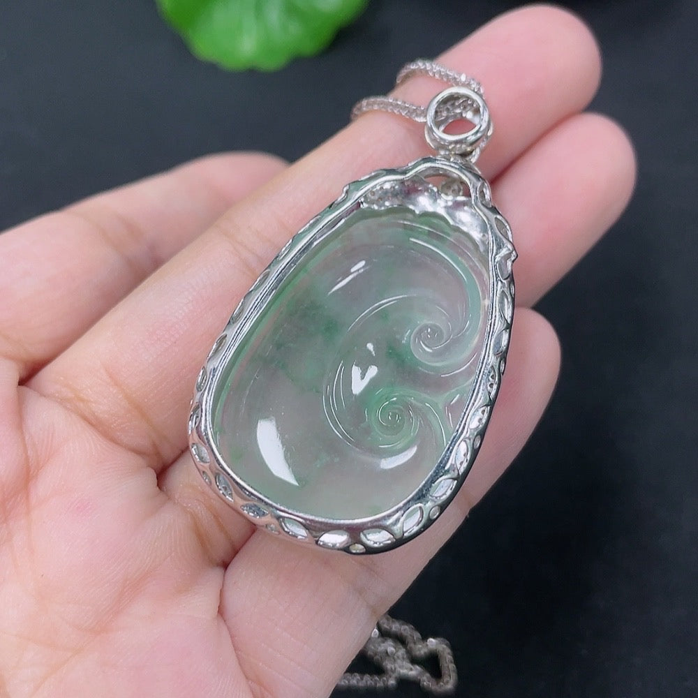 Jadeite Ruyi pendant with 18K gold and diamond accents, featuring intricate inlaid design on jade, with chain included.