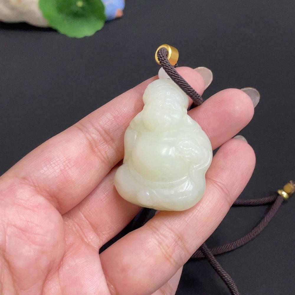 Hetian jade pendant featuring the God of Wealth, weighing approximately 34.8g, with a silk rope, crafted by HUILIU HQ.