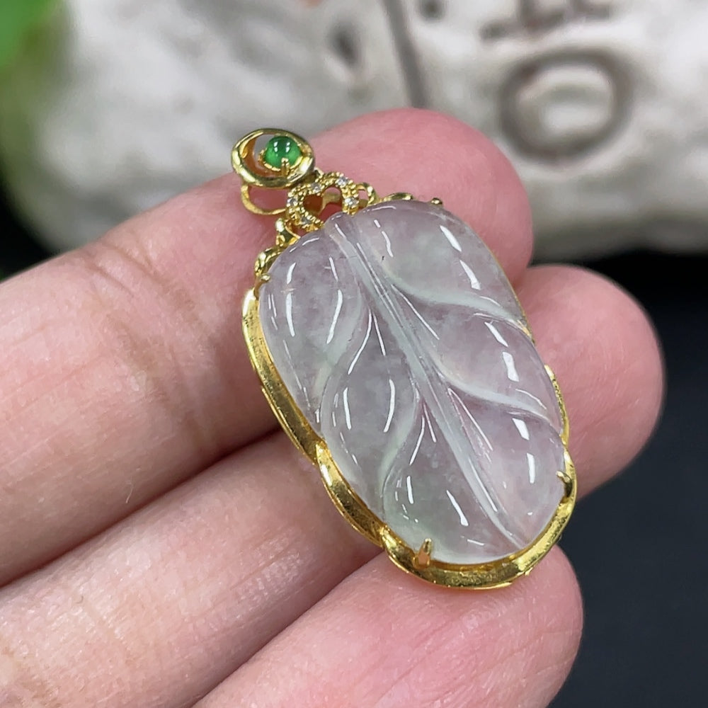 Jadeite leaf pendant with 18k gold inlay and diamond accents, HKHQ jewelry, featuring a detailed jade and gold design.