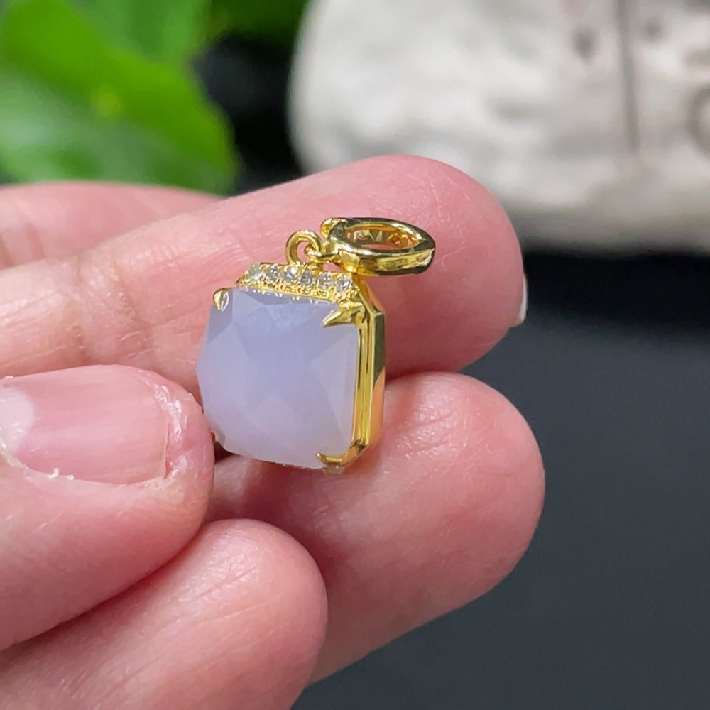 Huiliu Jadeite pendant with diamond accents on mount, showcasing vibrant green jade in an elegant jewelry design.