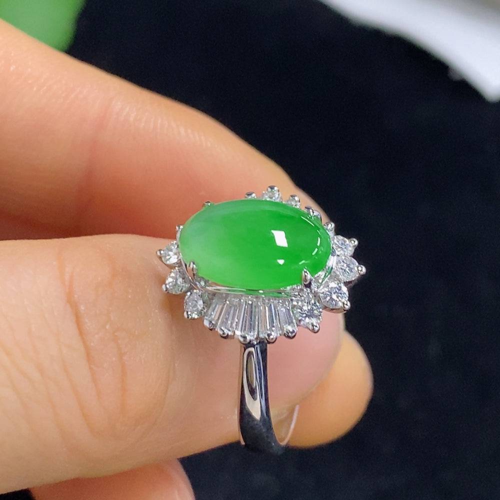 Huiliu Jadeite ring with diamond accents, showcasing a polished green jade gemstone set in a silver band.