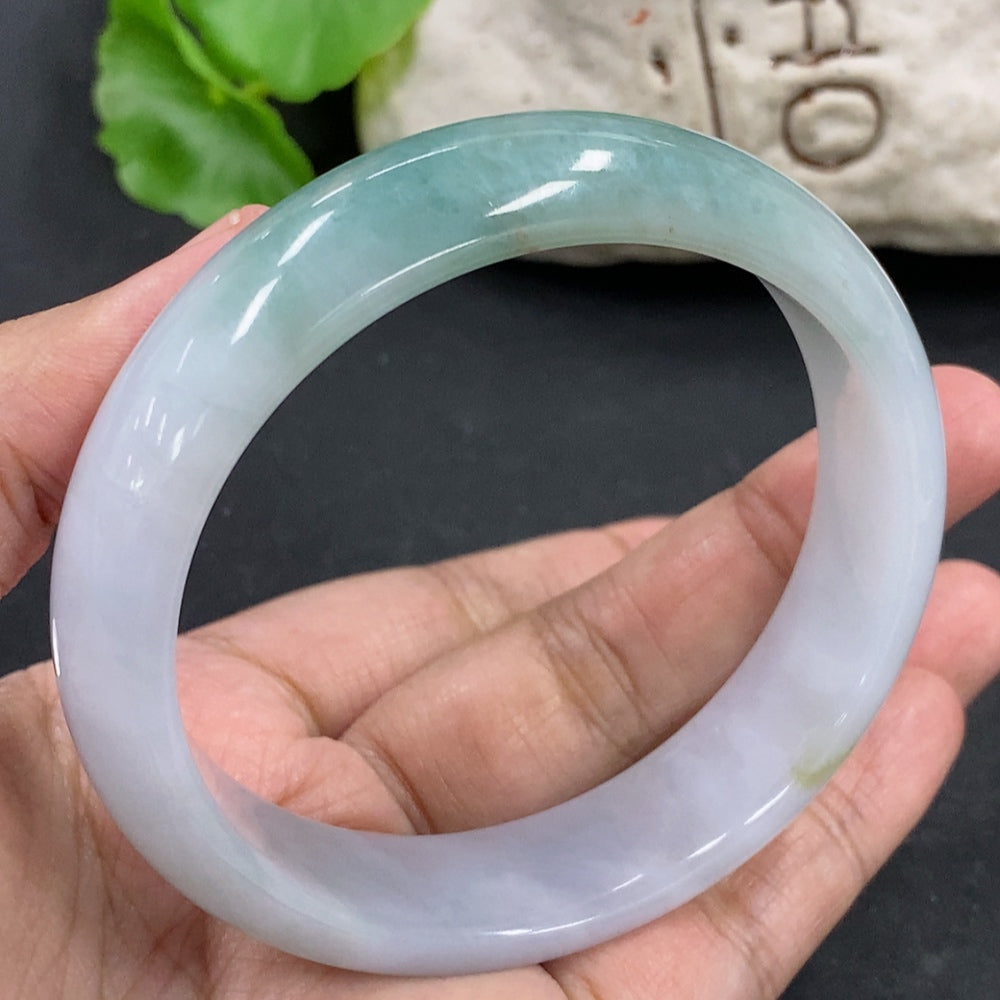 HKHQ jadeite round bracelet weighing 64.3g with a size of 59.4mm, featuring smooth, polished jadeite beads on a jewelry image.