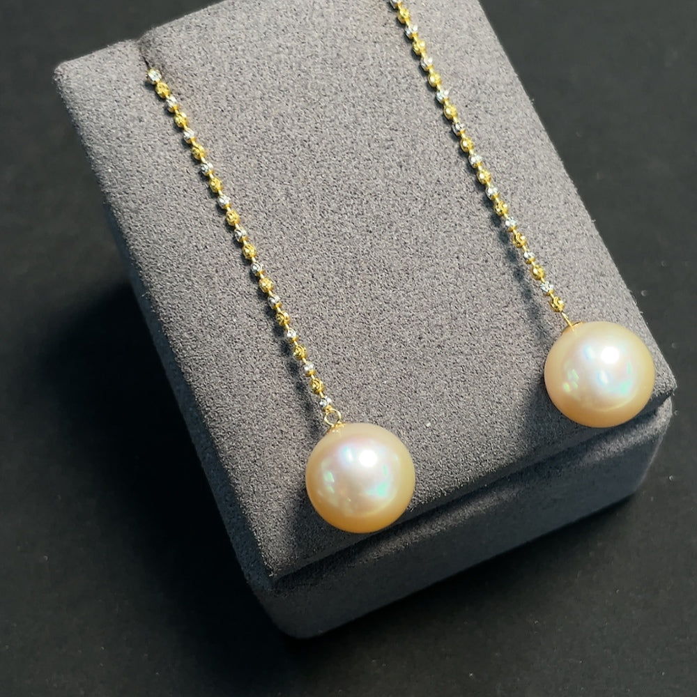 HKHQ seawater pearl earrings with 18K gold string, 12.4mm pearls, total weight 6.59g, natural color and elegant design
