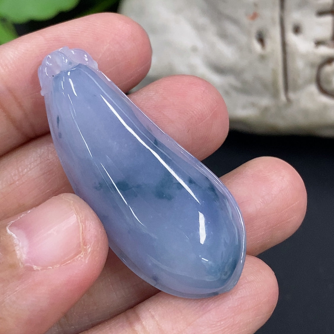 Jadeite auspicious gourd pendant featuring intricate carvings, weighing approximately 10.4g, from HKHQ.