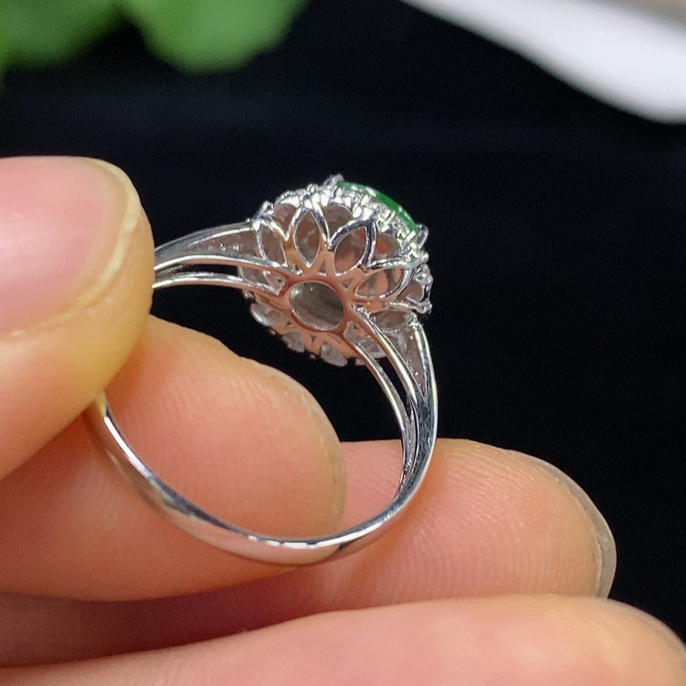 Jadeite ring with 18k gold band and diamond accents, size 14, showcasing the intricate design and vibrant green jade gemstone.