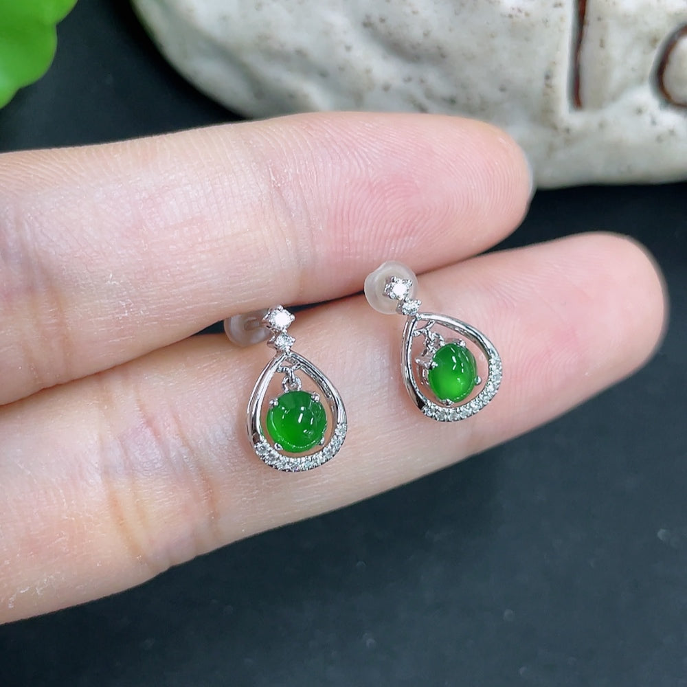 HKHQ jadeite earrings with 18k gold and diamond accents, lightweight jewelry featuring elegant green jadeite stones.