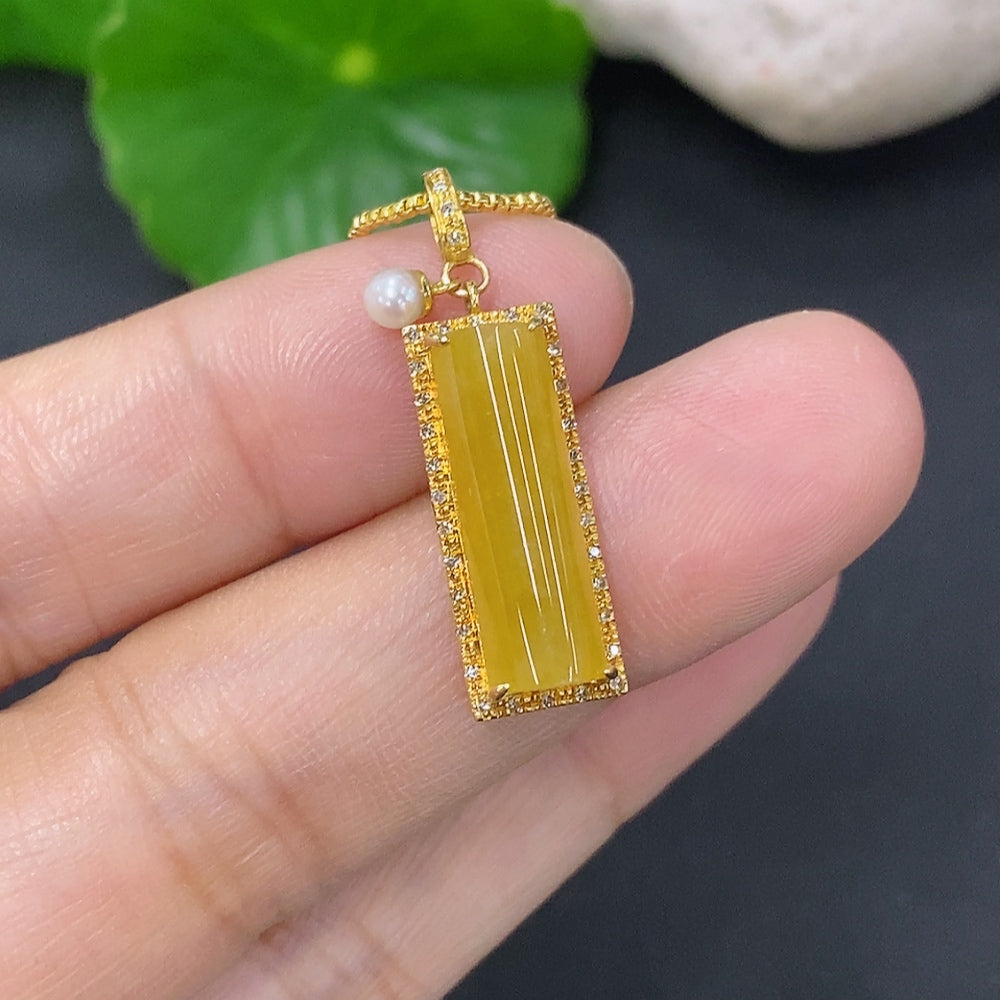 Jadeite plain pendant with 18K gold accents and diamond details, shown on a non-gold chain, handcrafted jade jewelry by HKHQ.
