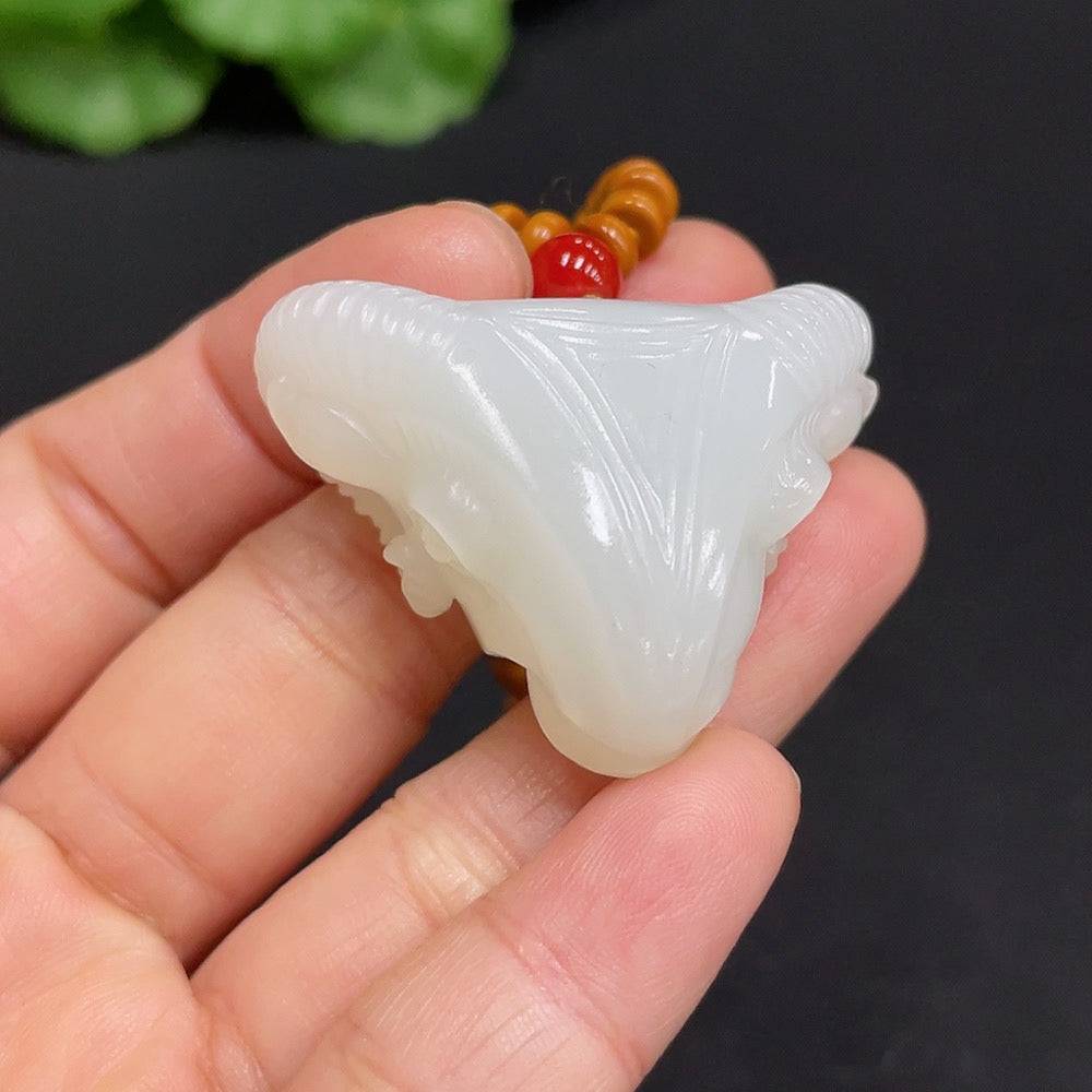 Huiliu HQ Hetian Jade pendant featuring an auspicious ram design, crafted from high-quality green jade stone.