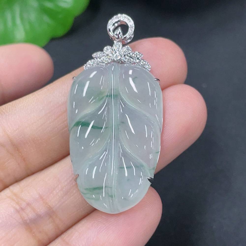 Jadeite leaf inlay pendant with 18K gold setting and diamond accents, crafted by HUILIU HQ, showcasing intricate jewelry design