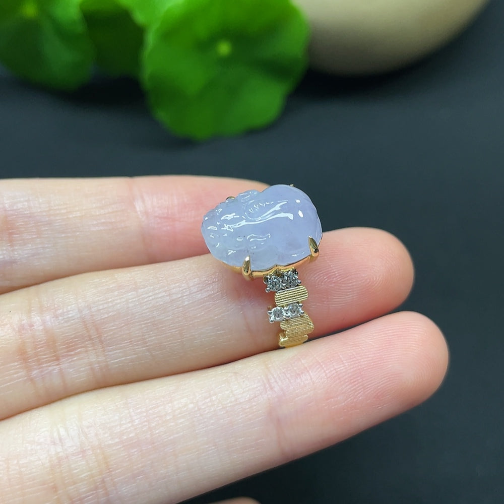 Jadeite Pi Xiu inlaid ring with 18K gold and diamond accents, featuring detailed craftsmanship, from HKHQ.